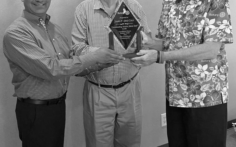 NOON ROTARY CLUB RECOGNITION - Jim Cole has been a Noon Rotary Club member for 27 years. Cole served in all officer capacities, he followed in his fathers foot steps, Percy Cole who was one of the founding members of the Levelland Rotary Club. Cole has moved to the Carillon in Lubbock to continue volunteering his time. Pictured from left to right are: Paul Quilantan, President of Noon Rotary Club Jim Cole and Phelps Blume, a long time friend. (Photo courtesy of Mary Siders)