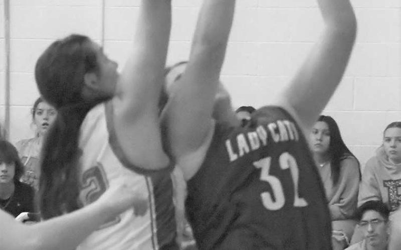 UP AND UNDER- Mollie Norman was a force under the basket for the Smyer Lady Cats last Tuesday on the road against the Ropes Lady Eagles in UIL high school girls’ basketball action. The Smyer girls lost 65-36 and will be in the Nazareth Tournament this weekend. The Lady Eagles will be in Breckenridge. (Photo by Jay Kelley)