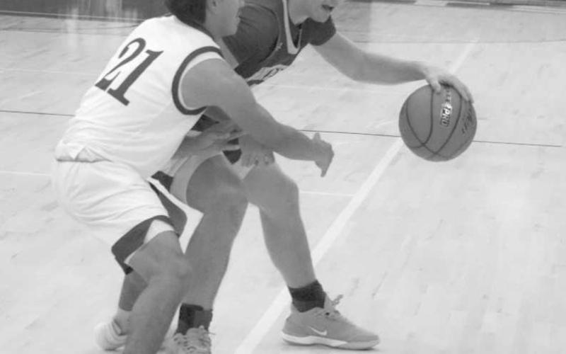 BALL SECURITY - Whiteface Antelope Ethan Kauffman guarded the basketball during the team’s game against the Farwell Steers in the Littlefield Tournament. (Staff photo by Aalijah Soliz)