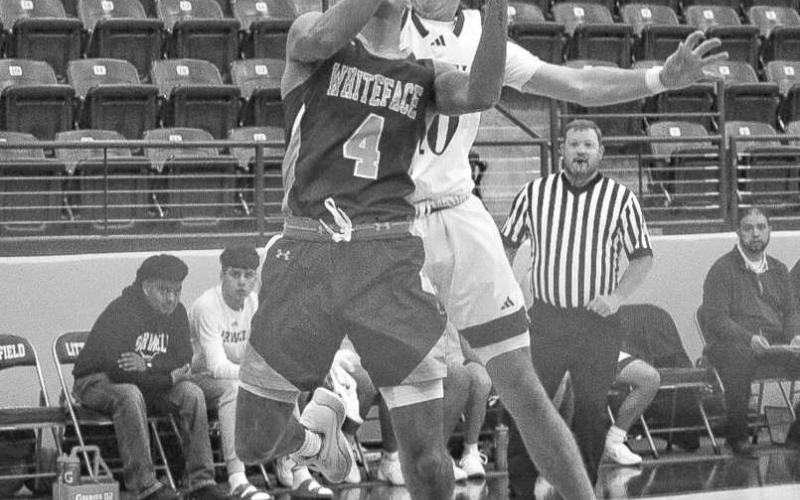 ATHLETIC FINISH - Whiteface Antelope Jeremiah Rendon made the tough lay-up through contact during the team’s first game of the Littlefield Tournament. (Staff photo by Aalijah Soliz)