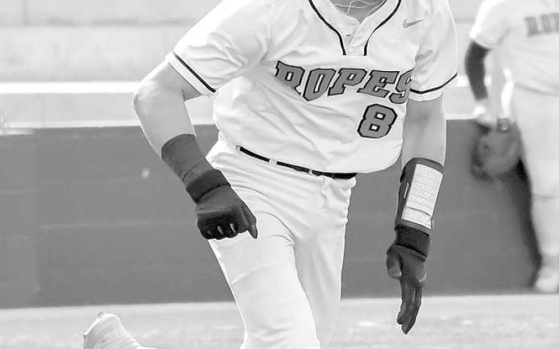 HEADED TO FIRST- The Ropes Eagles lost to Hawley two games to none in the UIL Regional High School Baseball Semifinals Thursday and Friday in Midland. The Eagles’ end their season as district runners-up, bi-district champions and regional quarterfinal champions. Eagle hitter Branson Beck hustled down the baseline on his way to first base. (Staff Photo by Dom Puente)