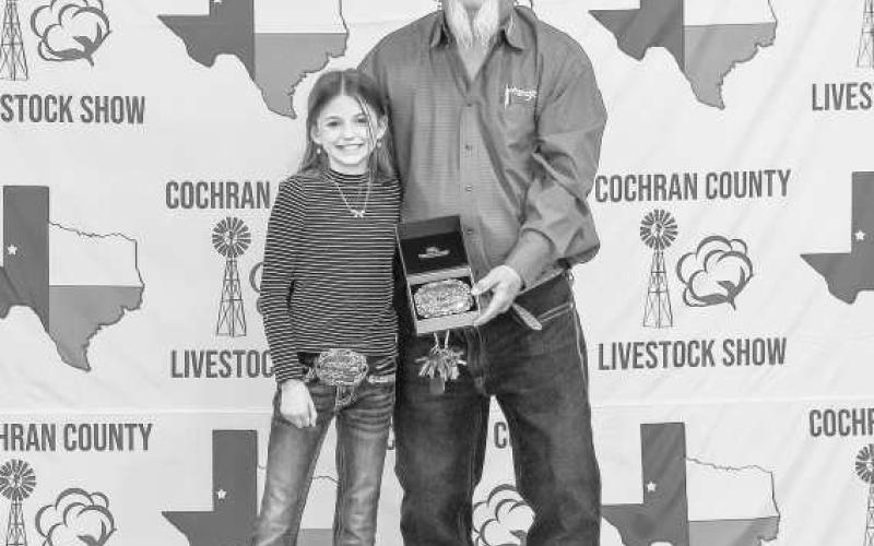 RESERVE GRAND CHAMPION RABBIT- Colyn Smith was awarded a buckle donated and presented by Jacob and Railey Silhan presented by Billy Joe Roberts this past weekend at the Cochran County Livestock Show. (Staff photo by Essence Childers)