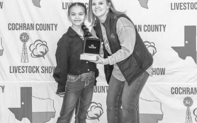 JUNIOR RABBIT SHOWMAN - Brecken Gates was awarded a buckle for Junior Rabbit Showman donated and presented by Rose Equipment at the Cochran County Livestock Show at the County Show Barn in Morton. (Staff photo by Essence Childers)