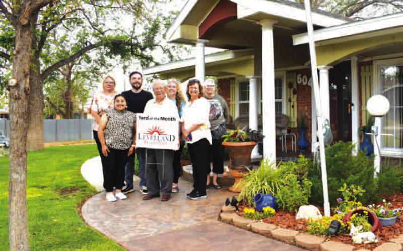 MAYYARD OFTHE MONTH - Keep Levelland Beautiful recongnition goes to Luis Perez for Yard of the Month for May located at 604 Cedar in Levelland. Pictured from right to left are: Kelly Hancock, Joseph Salas, Anastasia Maldonade, Luis Perez , Kati Moody, Tammy Franklin and Donna Weeler. (Staff photo by Emily Campos)