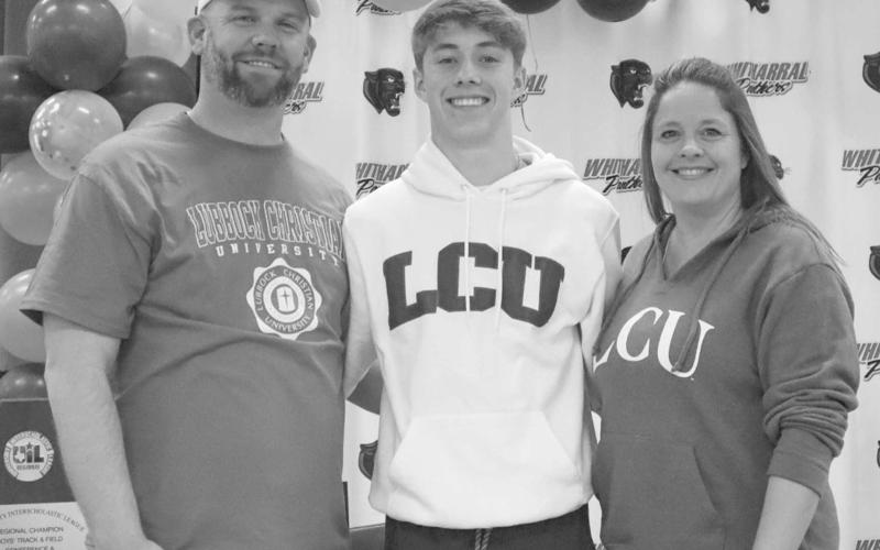 SIGNING - Whitharral Panther Landon Lee signed to LCU this past Wednesday for track and field while this family in front of his peers. Pictured above is Landon Lee and his parents Craig and Brandi Lee. (Staff photo by Aalijah Soliz)
