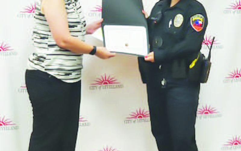 EVERYDAY HERO - Officer Fortner received their Intermediate Certificate on Friday at the LPD awards banquet. LPD Chief Erica O’Bryon presented the awards. (Photo courtesy of the LPD)