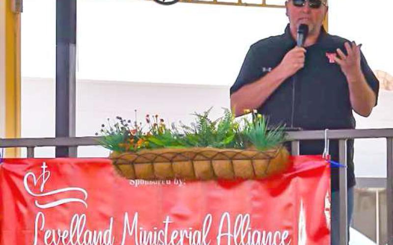 MINISTERIALALLIANCE - The Levelland MinisterialAlliance hosted the National Day Of Prayer on Thursday May 2, on the Levelland court house lawn. Pictured is Dean Richards who gave the Prayer for our Families. (Staff photo by Emily Campos)