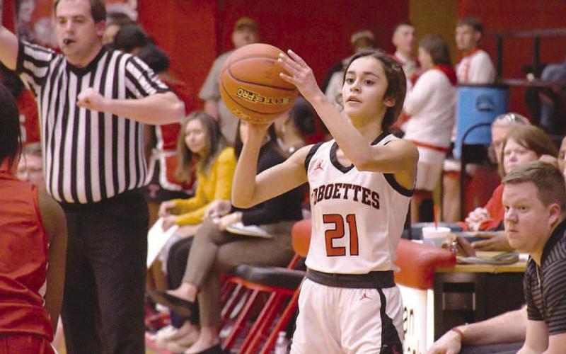 INBOUNDS- The fifth ranked Levelland Loboettes rolled out the welcome mat for the 15th ranked Tacosa Lady Rebels Friday. Loboette Carly Tienda passed the ball to a teammate on an inbounds play. Levelland will be back on the floor starting December 27th for the Littlefield Tournament. (Staff Photo by Dom Puente)