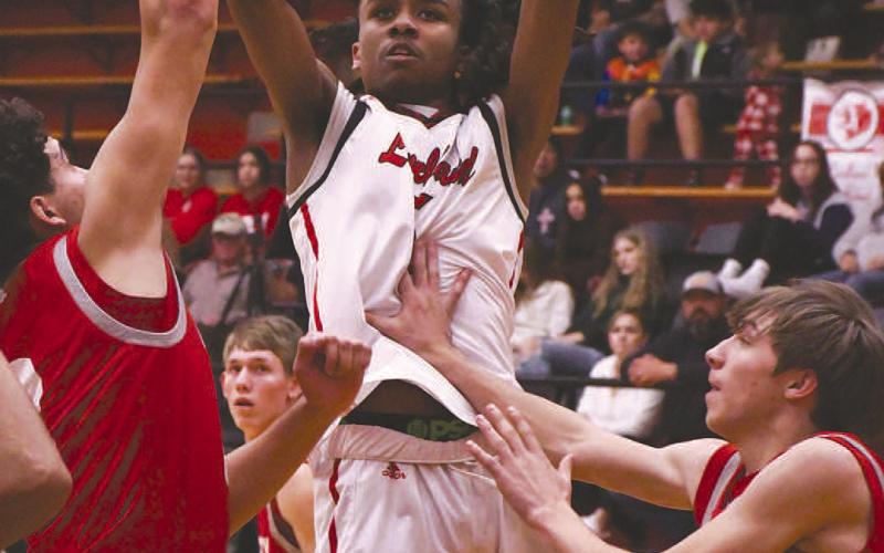 TOP SCORER- The Levelland Lobos got a much needed 53-36 home win over Denver City Friday. Taeshaun Jones led the team in scoring with 18 points. The Lobos are now 7-8 on the season. (Staff Photo by Dom Puente)