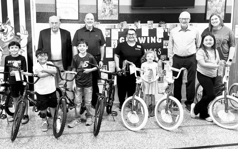SOUTH ELEMENTARY RIDE WITH ROTARY BIKE WINNERS – The Levelland Breakfast Rotary Club kicked off the 15th year of its Ride with Rotary program by presenting bicycles to these South Elementary students for perfect attendance for the first nine-weeks period. The bicycles were sponsored by South Plains Community Action Association and Walmart. Pictured from left to right are second grader Izalio Tienda, third grader Rick Matamoros, fourth grader Trace Gavina, second grader Cassity Burleson and fourth grader Ava