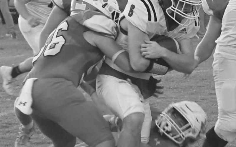 TOUGH RUNNING - The Smyer running game suffered against the Ropes Eagles in a 38-6 UIL Class 2A2 loss last Friday in Ropes. Preston Moore ran for three yards on 14 carries. The Bobcats will be in New Home next Friday at 7 p.m. (Staff photo by Jay Kelley)