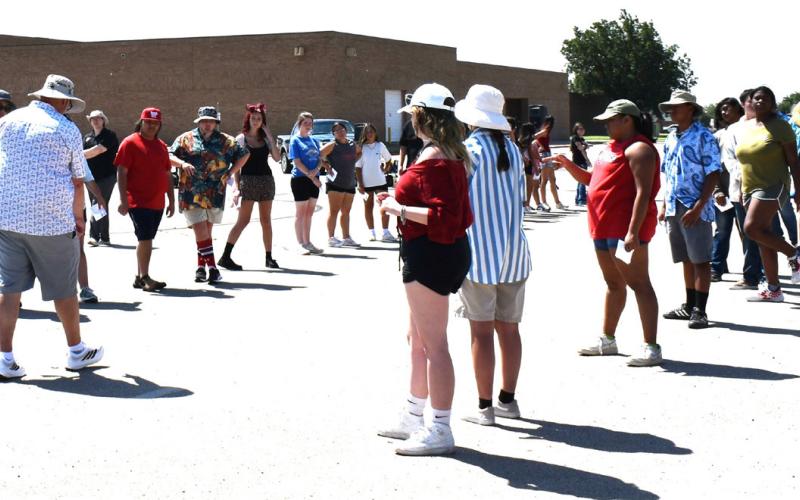 Lobo Marching Band at work - Band directors put the marching band through new routines and paces as they prepare for the upcoming year. (photo by Ada Niederhauser)
