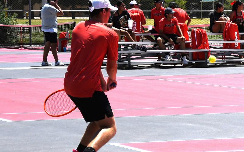 MONDAY TENNIS MATCH - LHS junior Reese Payton gets into position for a backhand during play against Lake View High School Monday afternoon. (Staff photo by Trinity Boudreaux)