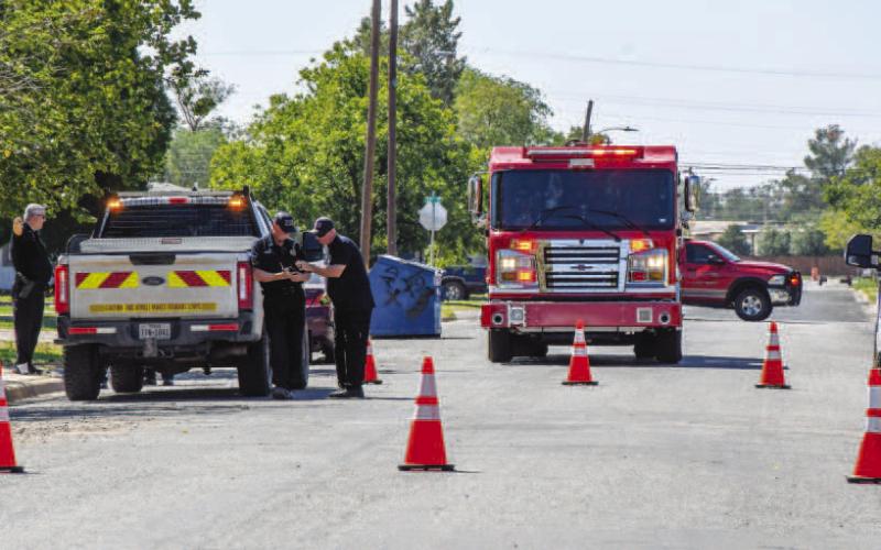 GAS LEAK - The Levelland Fire Department, Levelland and Hockley County Emergency Management, Levelland Police Department and Atmos Energy had personnel responding to a gas leak located on Avenue A between 11th and 12th Street. The line that was found to be leaking was scheduled to be shutoff on Tuesday, Sept. 17. However, with the detection of the leak, the crews shutoff the old line a day ahead of schedule. (Staff photo by Evin Thomas)