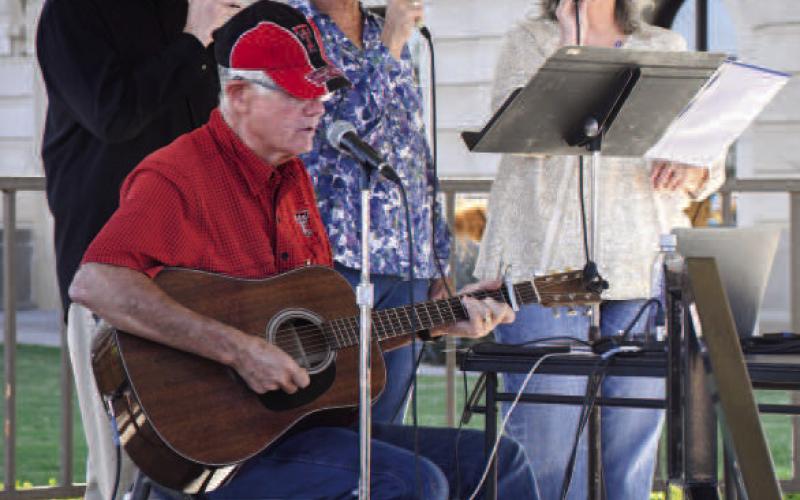 LIVE MUSIC AT THE LAWN – The showcase performance group First United Methodist Church Praise Team performed at the Hockley County Courthouse lawn at Saturday’s Falling for the Wallace. The quartet was one of multiple live music acts that played at the gazebo for the event, at the showcase. (Staff photo by Evin Thomas)