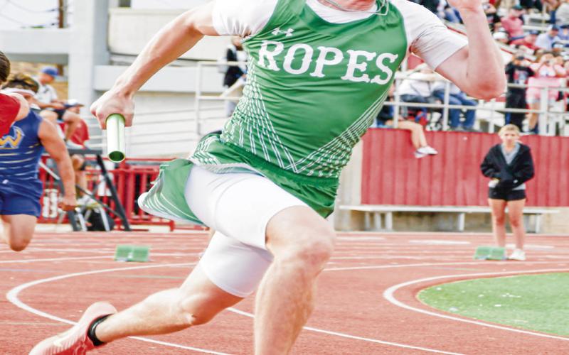 LEADOFF LEG - Ropes’ Zayden Pittman leads off the 4x100meter relay for Ropes this past Friday at the District Championships at Sundown High School. The relay would place first with a time of 43.57. (Staff photo by Jentezen Smith)