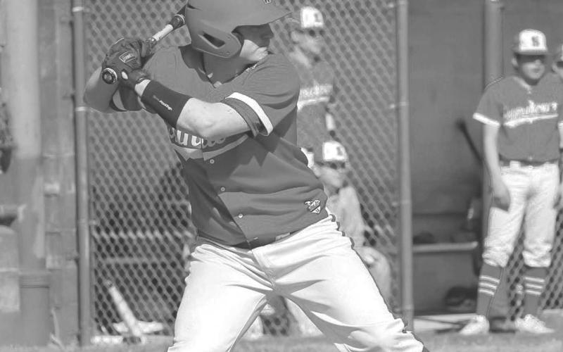 FOCUSED - Sundown Roughneck Rian Rose gor ready for Smyer Bobcat Austin Martinez’s pitch this past Monday for the team’s contest at Smyer for their district matchup. (Staff photo by Aalijah Soliz)