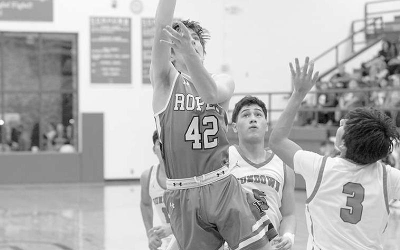 OFF BALANCE- Ropes Eagle Darren Kizer put up an off balanced shot against Sundown’s defense in a 60-51 district road loss. (Photo Courtesy of Donovan Martin)