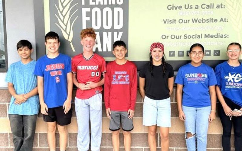 Sundown XC Volunteers - Coaches Dakotah Watson and April Berry took several of the Sundown cross country athletes to volunteer at the South Plains Food Bank. The Food Bank coordinator praised them for how much they were able to accomplish, how attentive they were, and the respect they showed throughout their entire volunteer shift.