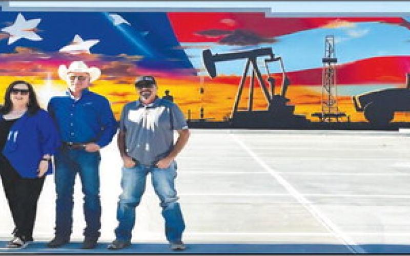 MURAL FOR THE COMMUNITY - The parking lot project was recently completed with Muralist Alfonso Garcia of Tulia completing his mural on the wall facing the lot. The parking lot is located across the Hockley County Annex at the corner of Austin Street and Avenue H. Pictured from left to right are: Tommy Clevenger, Alan Wisdom, Sharla Wisdom, Larry Carter and Seth Graf. (Photo courtesy of Kelli Martin)