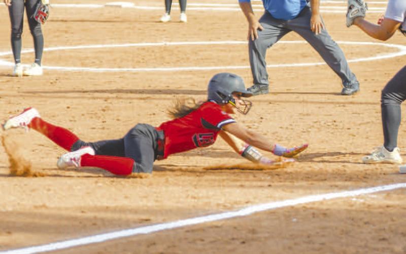 GOINGALL OUT - Levelland Loboette Saydi Mendoza took third base against the Snyder Lady Tigers at home, Tuesday. The Loboettes would get revenge against the Lady Tigers with a 6-5 win. The win puts both the Loboettes and the Lady Tigers at 6-1 in the district race for the top spot. The Loboettes hosted the Lakeview Maidens Friday at home.(Staff photo by Dom Puente)