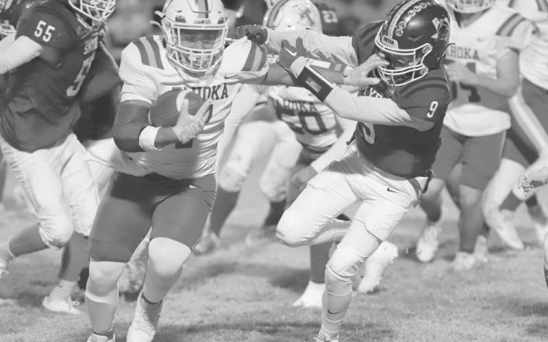 WRAPPED UP - Smyer Bobcat Skyler Pond fought off the stiff arm to bring down the Tahoak Ballcarrier this past Friday night at home. (Photo courtesy of Daniel Paredes)