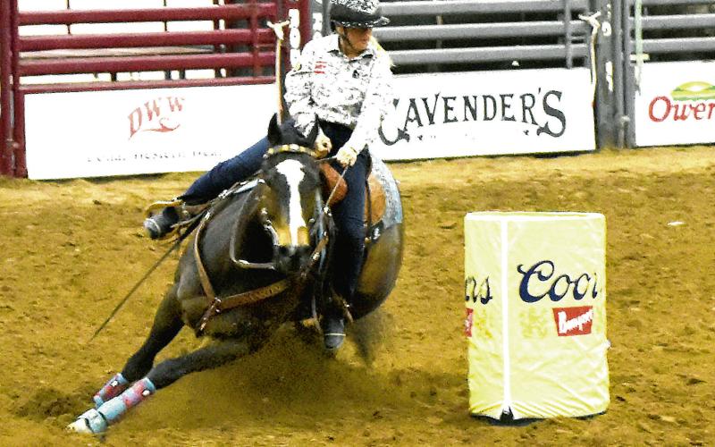 BARREL RACING - The ABC Professional Rodeo came to Levelland this past weekend and competed in the Mallet Event Center. Pictured above is the barrel racing competition. (Staff photo by Lynda Work)