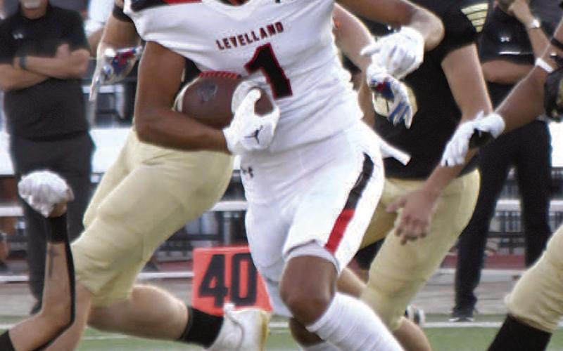 GETTINGUPTHEFIELD- Zameron LeCroy cut up the field after he made a reception against the Westerners’ defense.The Levelland Lobos fell to 0-3 after a Thursday loss against the Lubbock High Westerners 21-14 on the road in Lubbock. The Lobos will welcome the Estacado Matadors in to town for homecoming next Friday. (Staff Photo by Dom Puente)