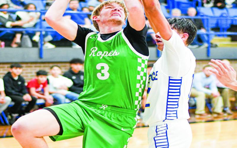 WORKIN’ IN THE POST - Ropes Eagle Kade Franklin goes up for a shot in the post during their district basketball game against Whiteface this past Tuesday at Whiteface High School. Franklin would be the games leading scorer with 21 points. (Staff photo by Jentezen Smith)