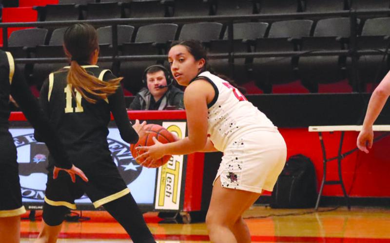 OFFENSE - Levelland Loboette Olivia Velardez got the ball in the post to run the offense through her so she could find the open teammate. (Staff photo by Aalijah Soliz)
