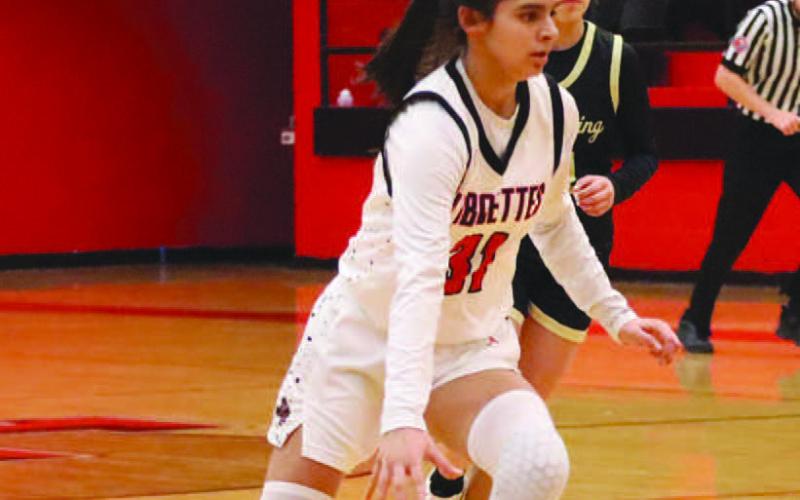 FULL SPEED - Levelland Loboette Leilani Sanchez brought the ball down the court after ripping down the rebound in the teams district opener win against the Big Spring Lady Steers. (Staff photo by Aalijah Soliz)