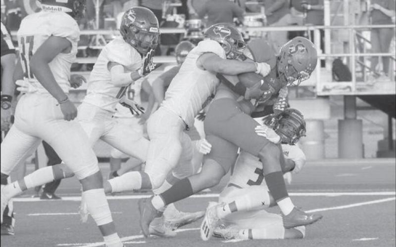 TOUGH RUNNING - Sundown athlete Jaxon Rodriguez ran the ball against the Farwell Steers to pick up some yards for the team. The Sundown Roughnecks lost in their homecoming game and plan to bounce back this Friday against Wink as the away team. (Staff photo by Aalijah Soliz)
