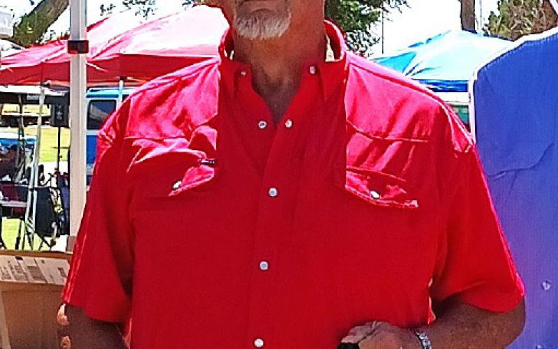 BEST MOPAR – Rocky Sheppard with a red 1969 Plymouth GTX. (Staff photo)