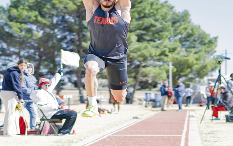 TRIPLE JUMPIN’ - SPC’s Adem Boulalbani performs a triple jump at the SPC West Texas Shootout this past Saturday at the South Plains College track facility. (Staff photo by Jentezen Smith)