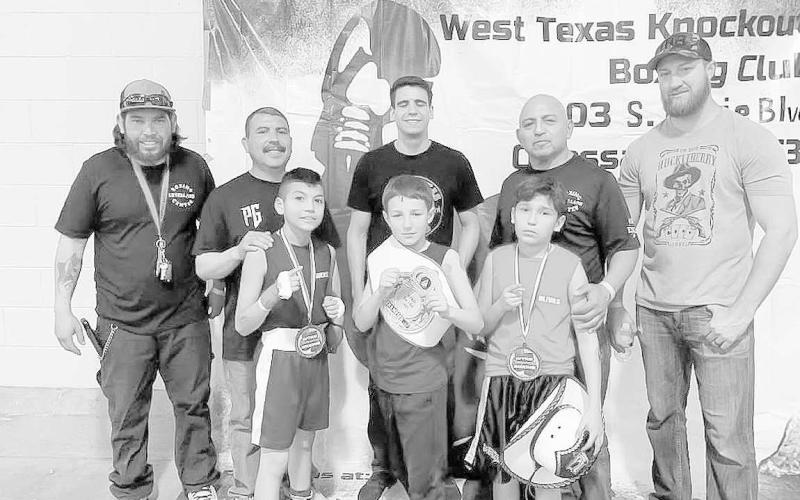 ODESSA SHOWCASE- On April 1st Shark Attack Boxing participated in the Odessa Boxing showcase. Cade Phelps won his match-up. Enrique Gonzales and Axel Gonzalez lost on decision. Pictured are: Coach Carlos Olivas, coach Ernest Gonzalez, coach Damian Nieland, coach John Espinoza, coach Trey Phelps, Enrique Olivas, Axel Gonzalez and Cade Phelps. (Photo Courtesy of Sharky Lecroy)
