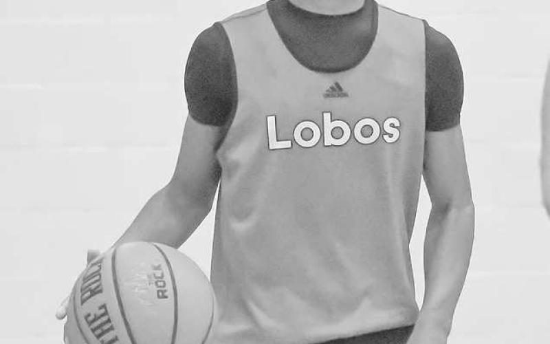 PUSHING THE BALL- Levelland Middle School hosted summer league basketball games Thursday. The Lobos rolled out the welcome mats for Olton and Littlefield. Lobo Bryson Golightly is pictured pushing the ball up the sideline. (Staff Photo by Aalijah Soliz)