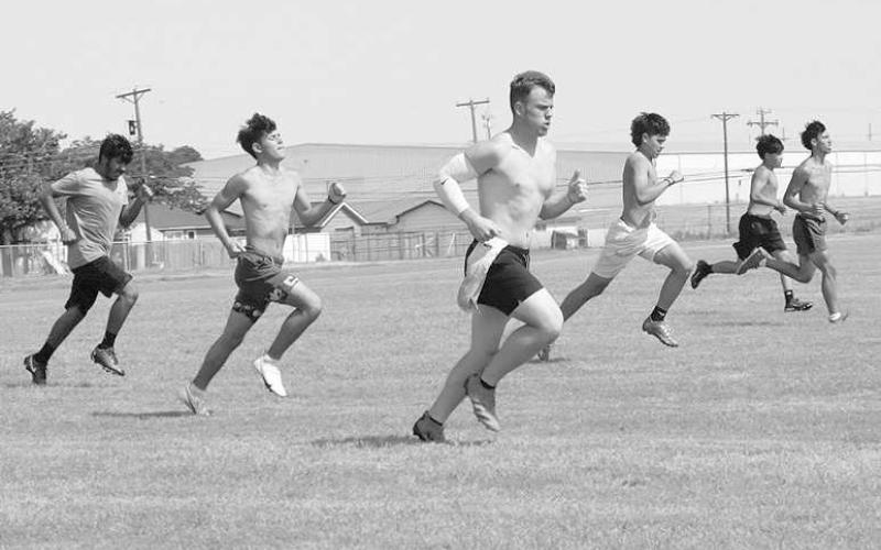 CONDITIONING- Levelland Lobo football players got some extra conditioning with sprints during summer workouts earlier this week. The Lobos will be in Lubbock Monday, June 26th for seven-on-seven action at Lubock High. The varsity team will take the field at 5:30 pm (Staff Photo by Aalijah Soliz)