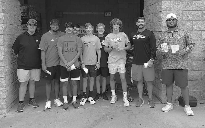 STUDENT ATHLETE VOLUNTEERS - Levelland High School athletes spent Saturday volunteering their time at the United Supermarket in Levelland collecting food items for Bill’s Packbacks. Pictured from left to right: Coache Matt Bruce, Coach Kendall Durrett, Zaden Carillo, Julian Sanchez, Gavin French Brian Billington, Jacob Swain, Coach Chris Portwood and Coach Ramiro Serrato. (Staff Photo)