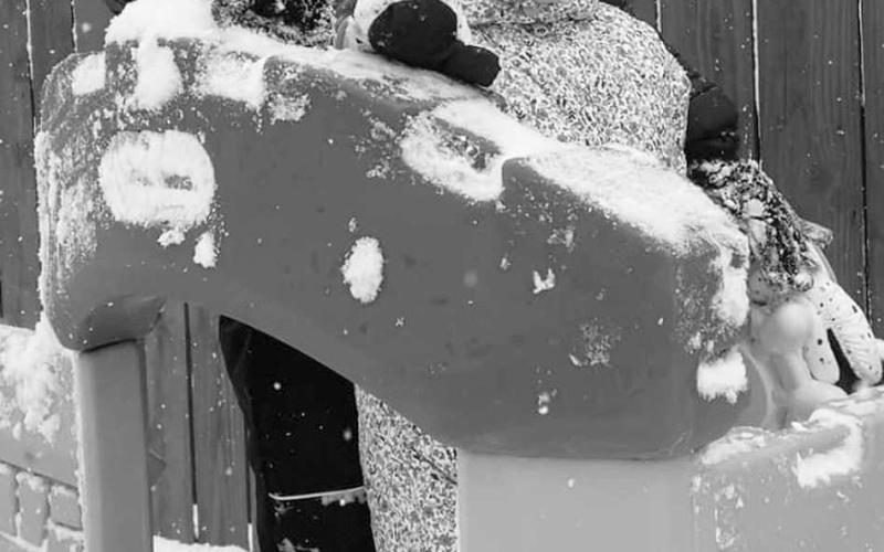 LATE WINTER SURPRISE - Throughout West Texas, area schools put a halt to the school day Tuesday as a 24 hour winter weather storm scattered snow throughout the region. Enjoying their time off from school Tuesday were Jett and Mila Gonzales. (Submitted photo by Bethany Gonzales)
