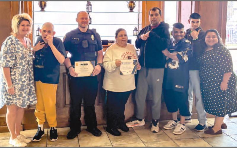 CONTINUED RECOGNITION - Levelland PD’s Officer Moody was recognized for his efforts, quick thinking and bravery in stopping a runaway can with brake failure in March. ResCare recognized Moody with a Hero Award during a reception last week. Additionally, the driver of the van was also recognized for her calm demeanor and ability to keep the clients calm during the traumatic incident. (Photo courtesy of the LPD)