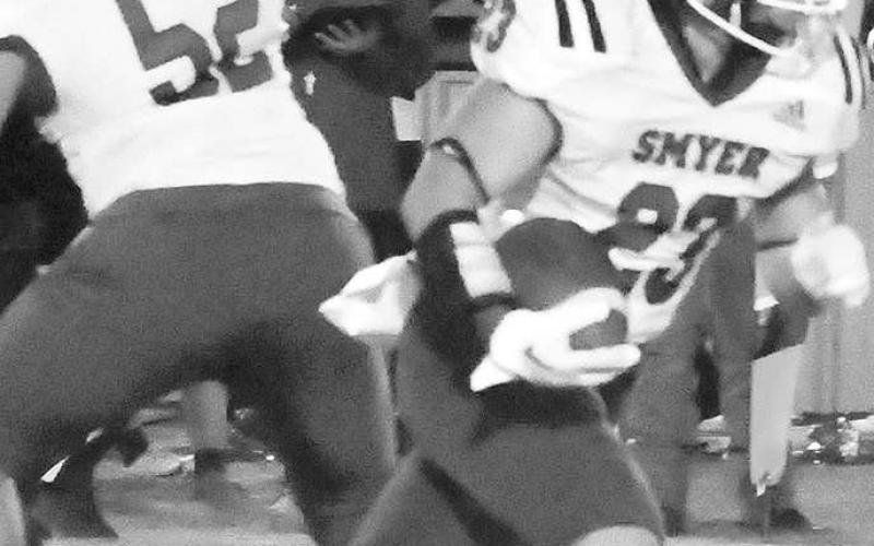 FIRSTDOWNRUN- Christian Charles had eight carries for 48 yards for the Smyer Bobcats in a 24-12 road win over the Morton Indians last Friday in UIL high school football action. Smyer will host Seagraves on Friday while Morton hosts New Home. Games start at 7 p.m. (Photo Courtesy of Jay Kelley)