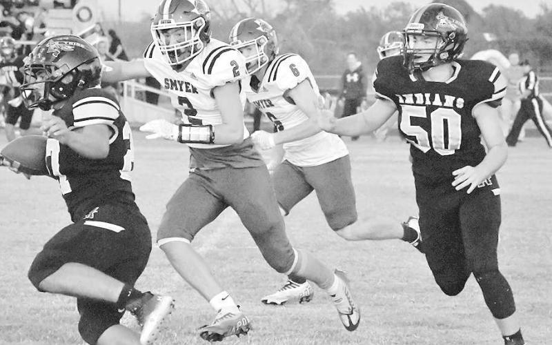 BOUNCE OUTSIDE- Andreas Bejarano had four carries for 21 yards for the Morton Indians in a 24-12 home loss to the Smyer Bobcats last Friday in UIL high school football action. Morton will host New Home on Friday at 7 p.m. while Smyer hosts Seagraves. (Photo Courtesy of Jay Kelley)