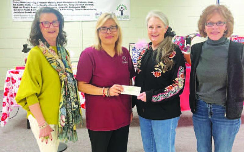 SUCCESSFUL QUILT RAFFLE-- Members of Xi Theta Pi recently donated to the Hockey County Senior Citizens Association. The proceeds were from the quilt raffle held in December by Xi Theta Pi (Photo courtesy of Ann Capps)
