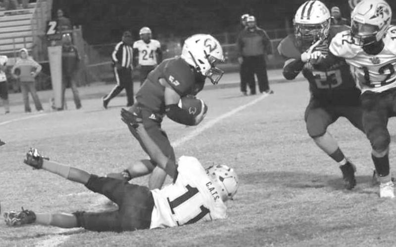 WON’T GO DOWN - Cash Crutcher had two touchdowns for the Whiteface Antelopes in their UIL District 3-1A1 high school football home opener last Friday. The Antelopes crushed the Wellman-Union Wildcats 68-0 and will be in Meadow to continue district play next Friday at 7:30 p.m. for more district action. (Photo by Holly Crutcher)