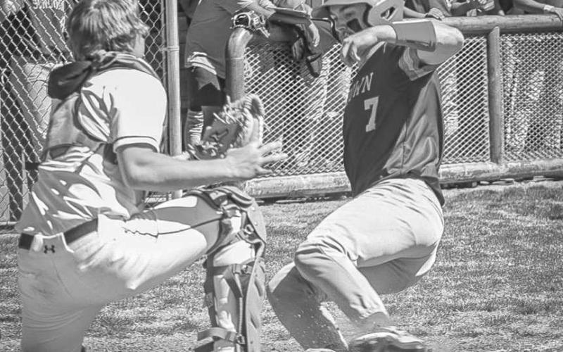 CLOSE CALL - Sundown Roughneck Caleb Clausen slid into Ropes Eagle catcher Brady Bryan during both team’s contest against each other last Thursday in Ropes. (Staff photo by Aalijsh Soliz)