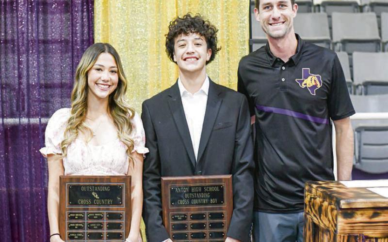 CROSS COUNTRY AWARDS - Outstanding Girl Athlete: Alisiah Alafa and Outstanding Boy Athlete: Isaiah Alafa. (Staff photo by Jentezen Smith)
