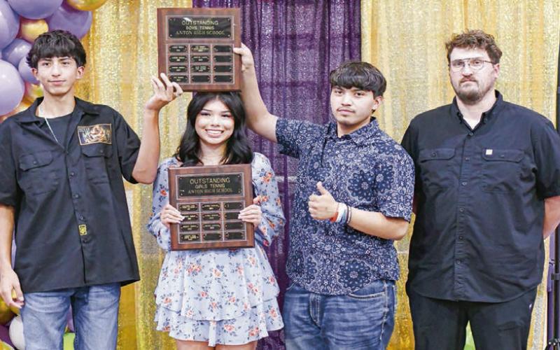 TENNIS AWARDS - Outstanding Girl Athlete: Miliana Castillo and Outstanding Boy Athletes: Juan Puente and Tiny Juarez. (Staff photo by Jentezen Smith)