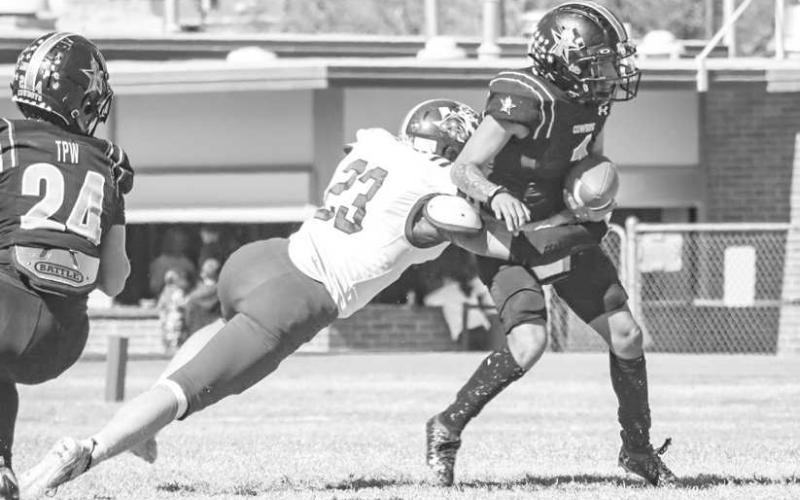 DIVING TACKLE - Smyer Bobcat Wyatt Bartels tackled the Plains ballcarrier this past Thursday afternoon during the team’s district game on the road. (Staff photo by Aalijah Soliz)