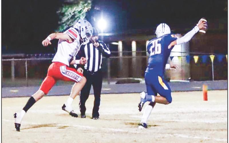 STUNTIN’ ON ‘EM - Whiteface junior Ryland Jones stunts on a Borden County defender as he runs into end zone to score a touchdown this past Friday at Antelope Stadium. Jones’ touchdown would end up being the game winner. (Provided by Whiteface Victory Line Facebook)