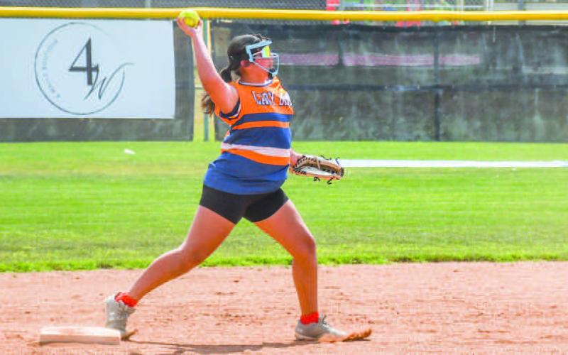 PERFECTING THE DOUBLE PLAY – Jenesis King worked on her fielding and throwing skills at second base at the Loboette Softball during their annual summer clinic on May 29. (Staff photo by Hannah Woodrum)